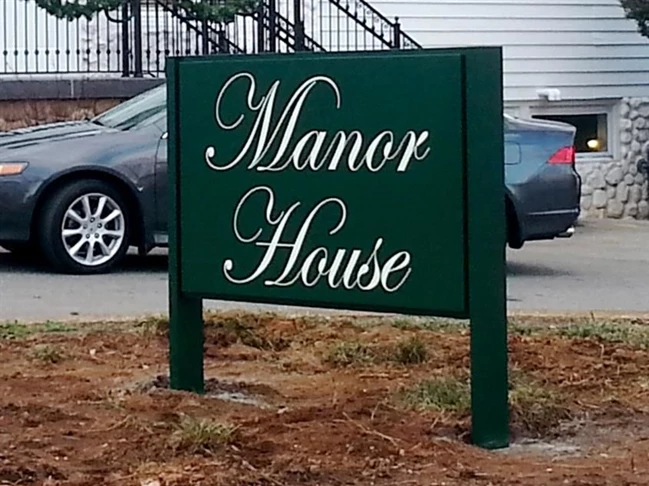 The Manor House at Tanglewood Park.  It looks better now that theyve replanted around the sign.
